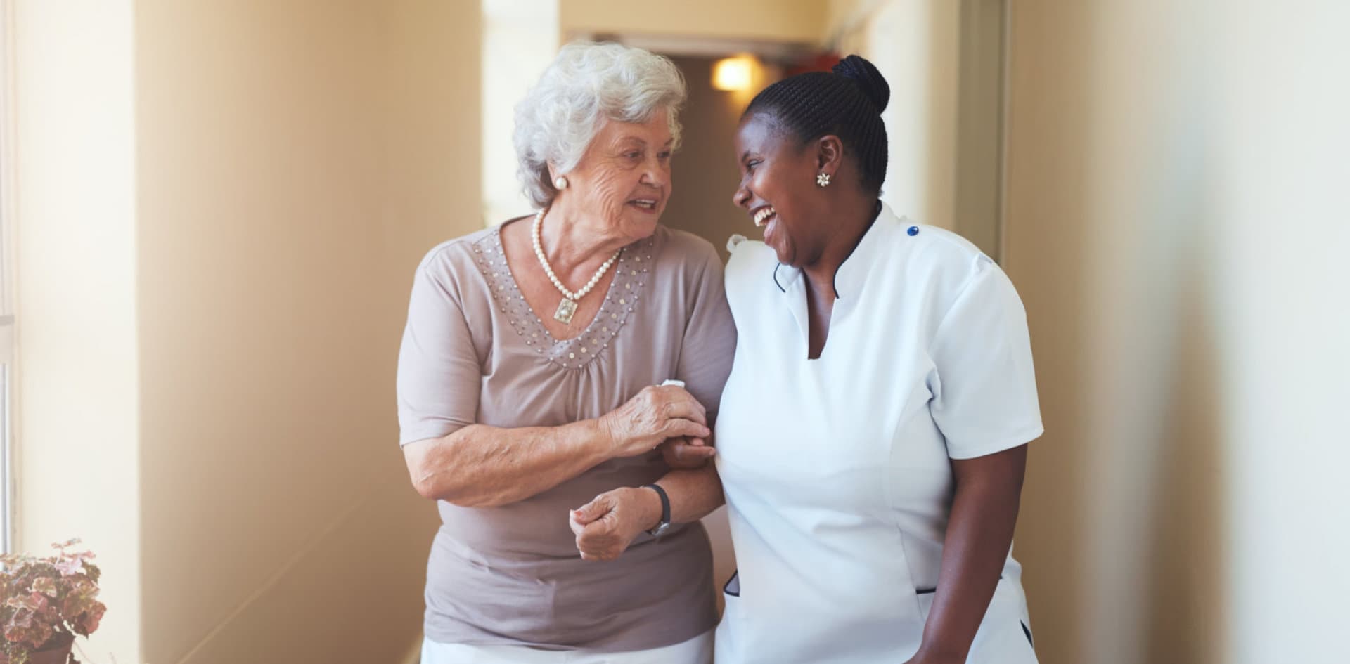 caregiver and her patient having a laugh